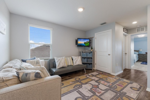 living room featuring dark hardwood / wood-style floors