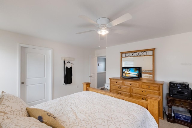 bedroom with ceiling fan and carpet floors