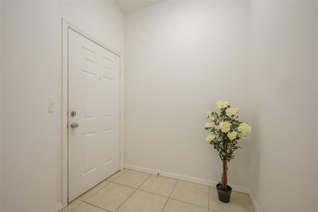 doorway featuring light tile patterned floors