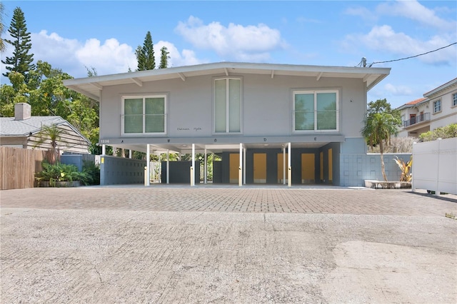 view of front of home with a carport