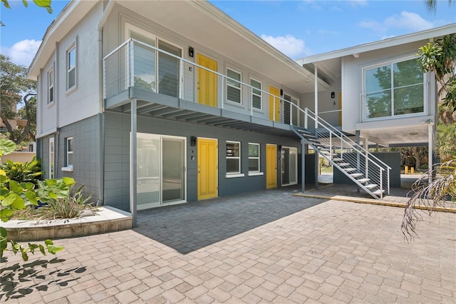 back of house featuring a patio