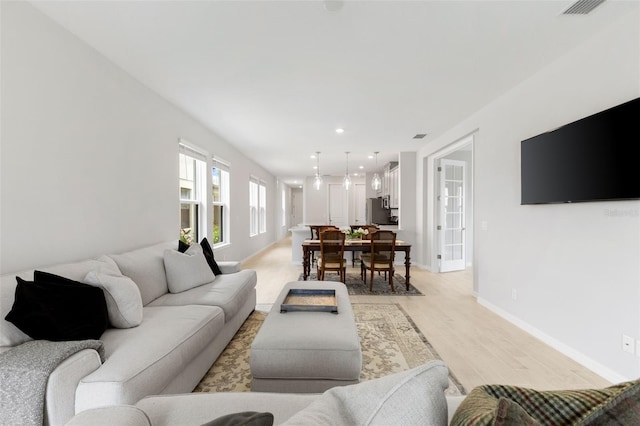 living room with light wood-type flooring