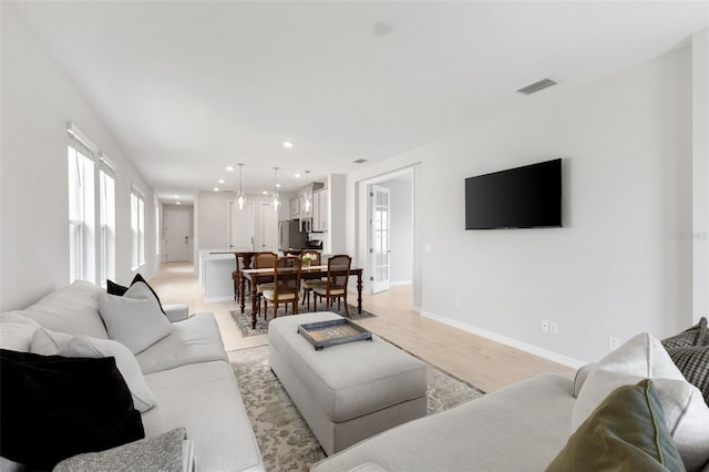 living room featuring light wood-type flooring