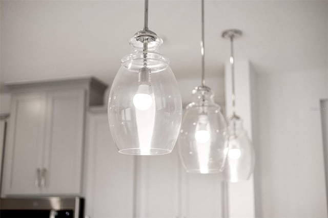 details featuring white cabinetry