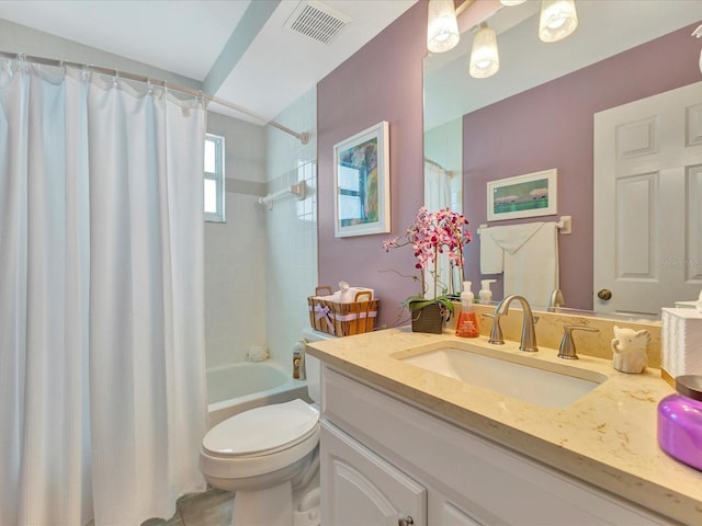 full bathroom with shower / bath combo, vanity, and toilet