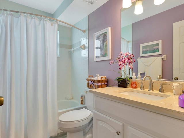 full bathroom featuring vanity, toilet, and shower / bathtub combination with curtain