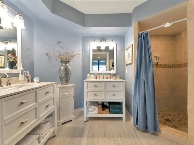 bathroom featuring vanity and walk in shower