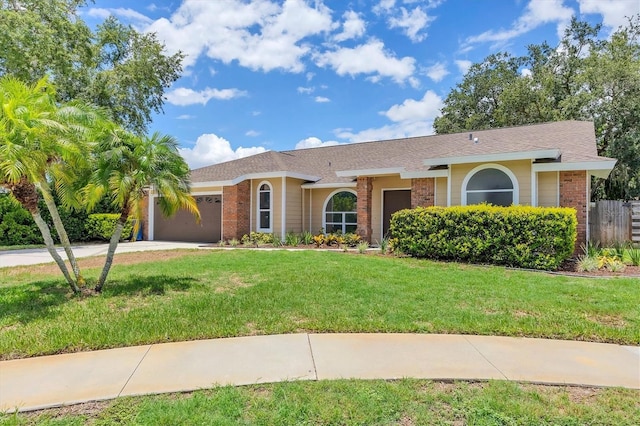 single story home with a front lawn and a garage