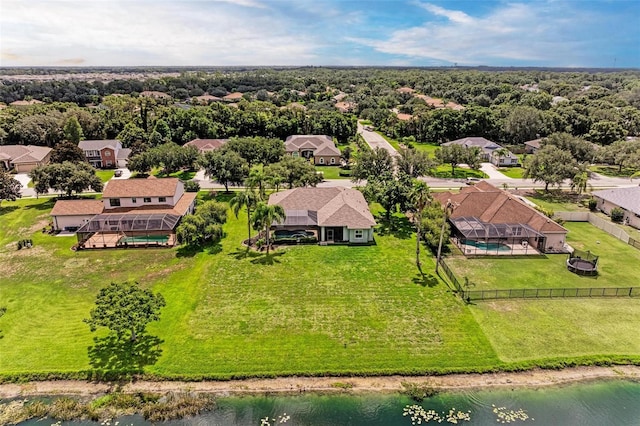 birds eye view of property featuring a water view