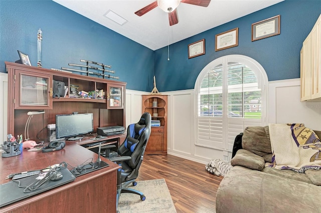 home office with hardwood / wood-style flooring and ceiling fan