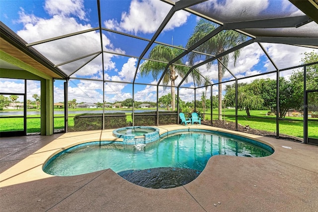 view of pool with a lanai, a patio area, an in ground hot tub, and a lawn