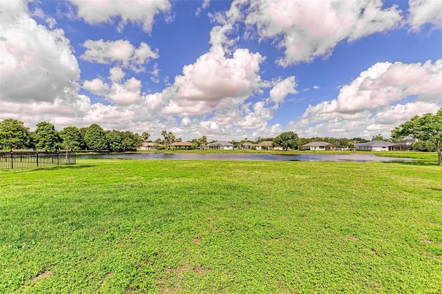 view of yard with a water view