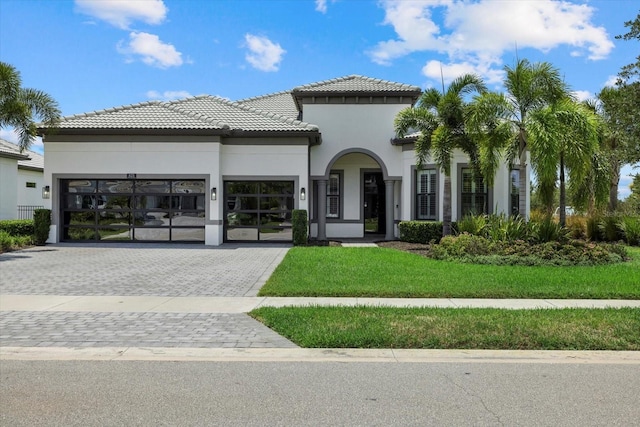 view of front of property with a front lawn