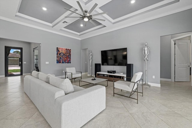 living room featuring ceiling fan, a high ceiling, coffered ceiling, and ornamental molding