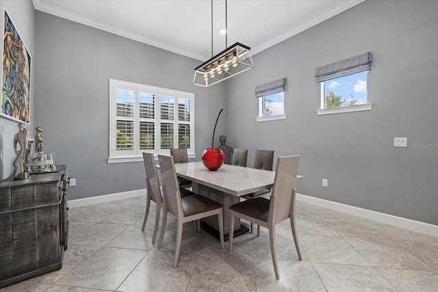 dining space featuring ornamental molding