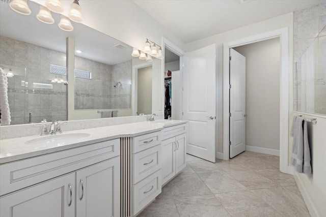 bathroom with vanity and walk in shower