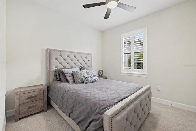 bedroom with light colored carpet and ceiling fan