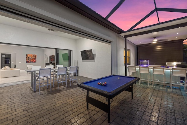 view of patio / terrace with glass enclosure