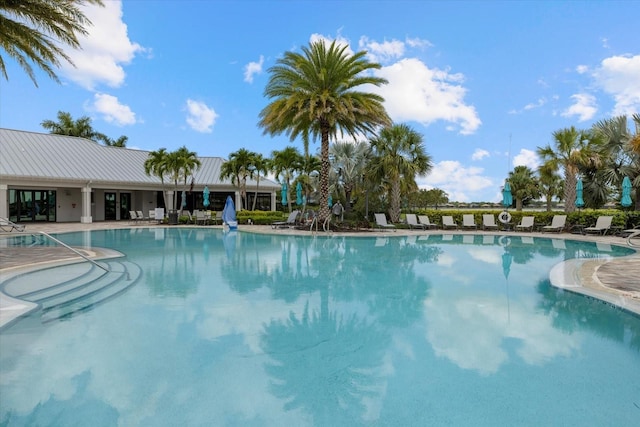 view of swimming pool with a patio area