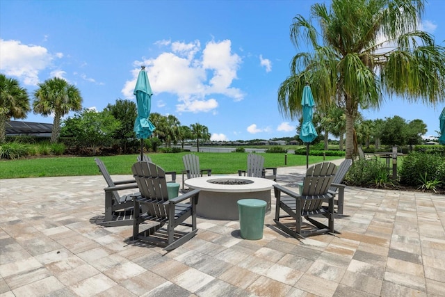 view of patio with an outdoor fire pit