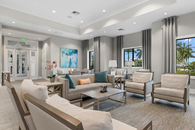 living room with ornamental molding