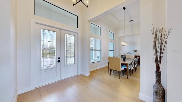 entrance foyer featuring hardwood / wood-style flooring