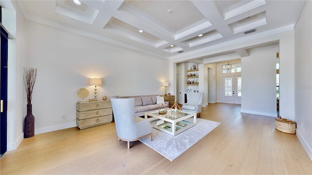 living room with beam ceiling, hardwood / wood-style flooring, crown molding, and coffered ceiling