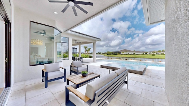 view of patio / terrace featuring outdoor lounge area and ceiling fan