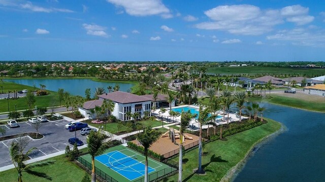 birds eye view of property featuring a water view