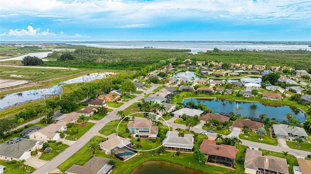 aerial view featuring a water view