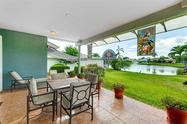 view of patio / terrace with a water view