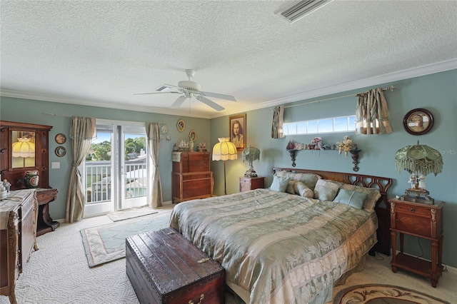 8607 51st Ave W, Bradenton, FL 34210 - carpeted bedroom featuring access to outside, ornamental molding, a textured ceiling, and ceiling fan