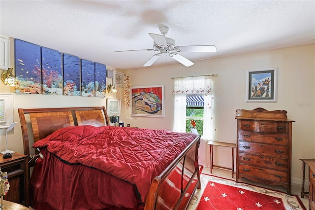 8607 51st Ave W, Bradenton, FL 34210 - bedroom with a textured ceiling and a ceiling fan