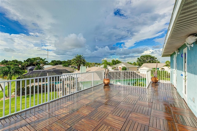 8607 51st Ave W, Bradenton, FL 34210 - wooden terrace featuring a residential view and a lawn