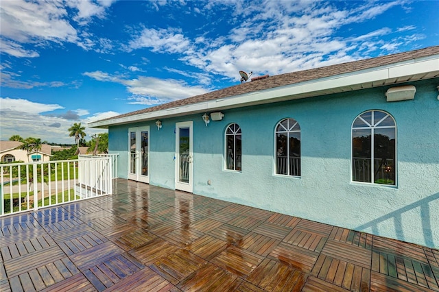 8607 51st Ave W, Bradenton, FL 34210 - wooden terrace with french doors