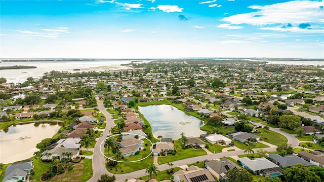 8607 51st Ave W, Bradenton, FL 34210 - aerial overview of property's location featuring a large body of water and nearby suburban area