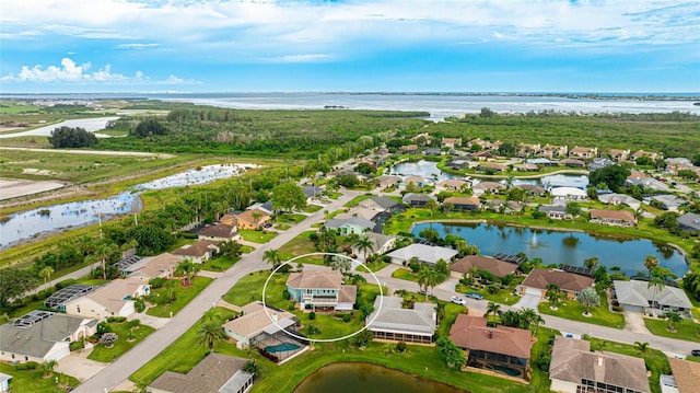 8607 51st Ave W, Bradenton, FL 34210 - aerial overview of property's location featuring nearby suburban area and a large body of water