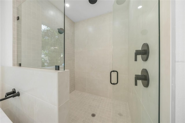 bathroom featuring an enclosed shower