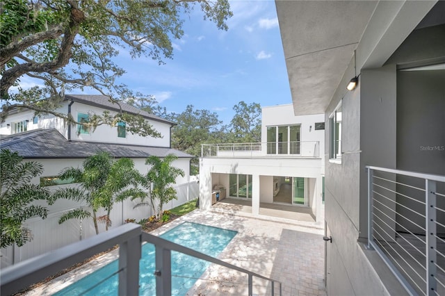 view of swimming pool featuring a patio