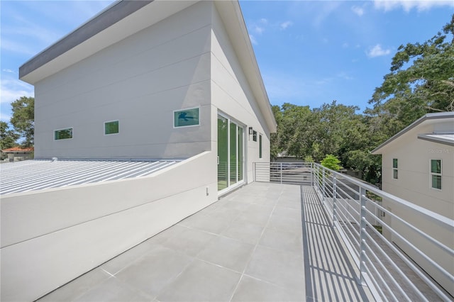 view of patio with a balcony