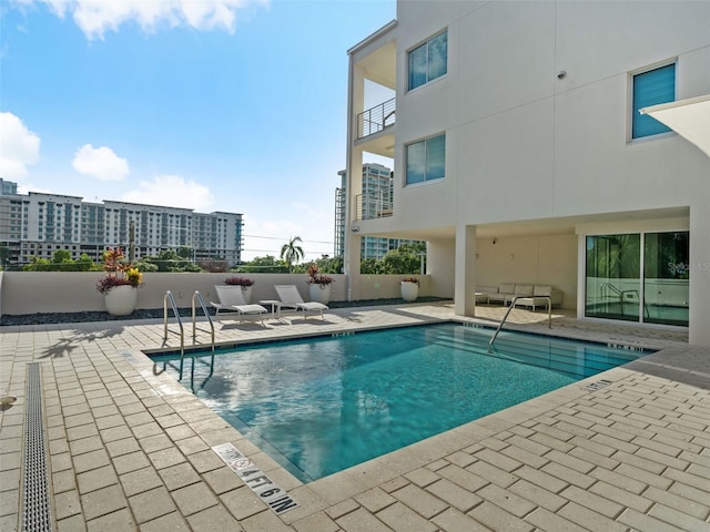 view of pool with a patio