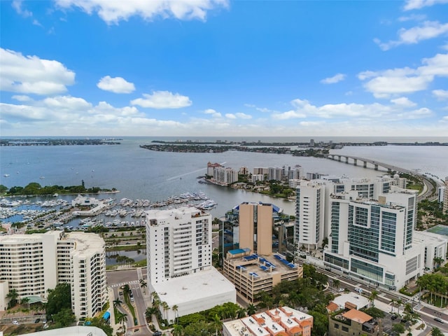 birds eye view of property featuring a water view