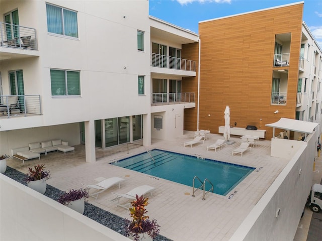 view of pool with a patio area