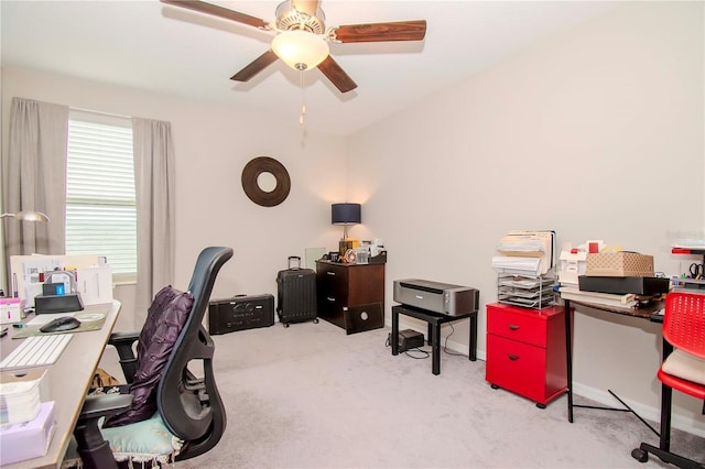 carpeted office with ceiling fan