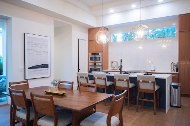 dining room with wood-type flooring