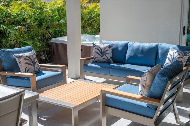 view of patio featuring an outdoor hangout area and a hot tub