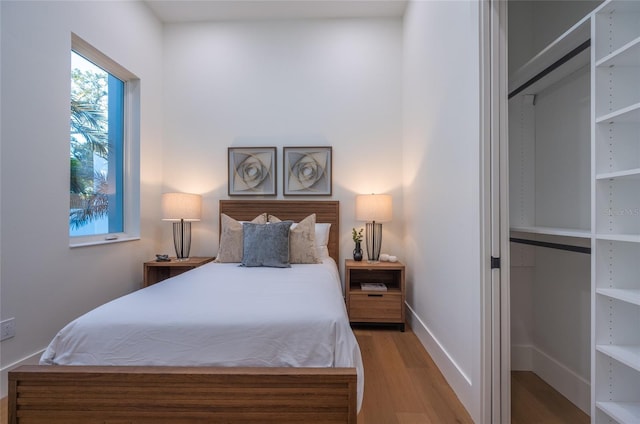 bedroom featuring hardwood / wood-style floors