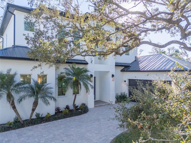 view of front of house with a garage