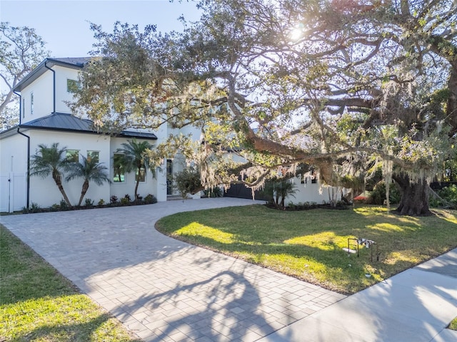 view of front of house with a front lawn