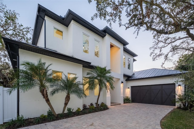 modern home featuring a garage